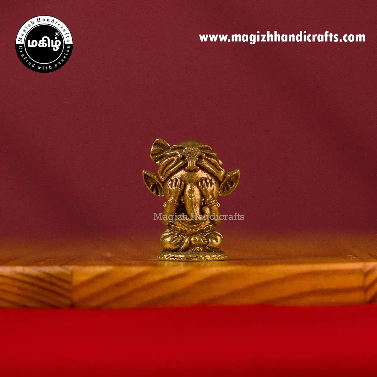 Brass Mini Ganesha closing eyes idol - 1 inch