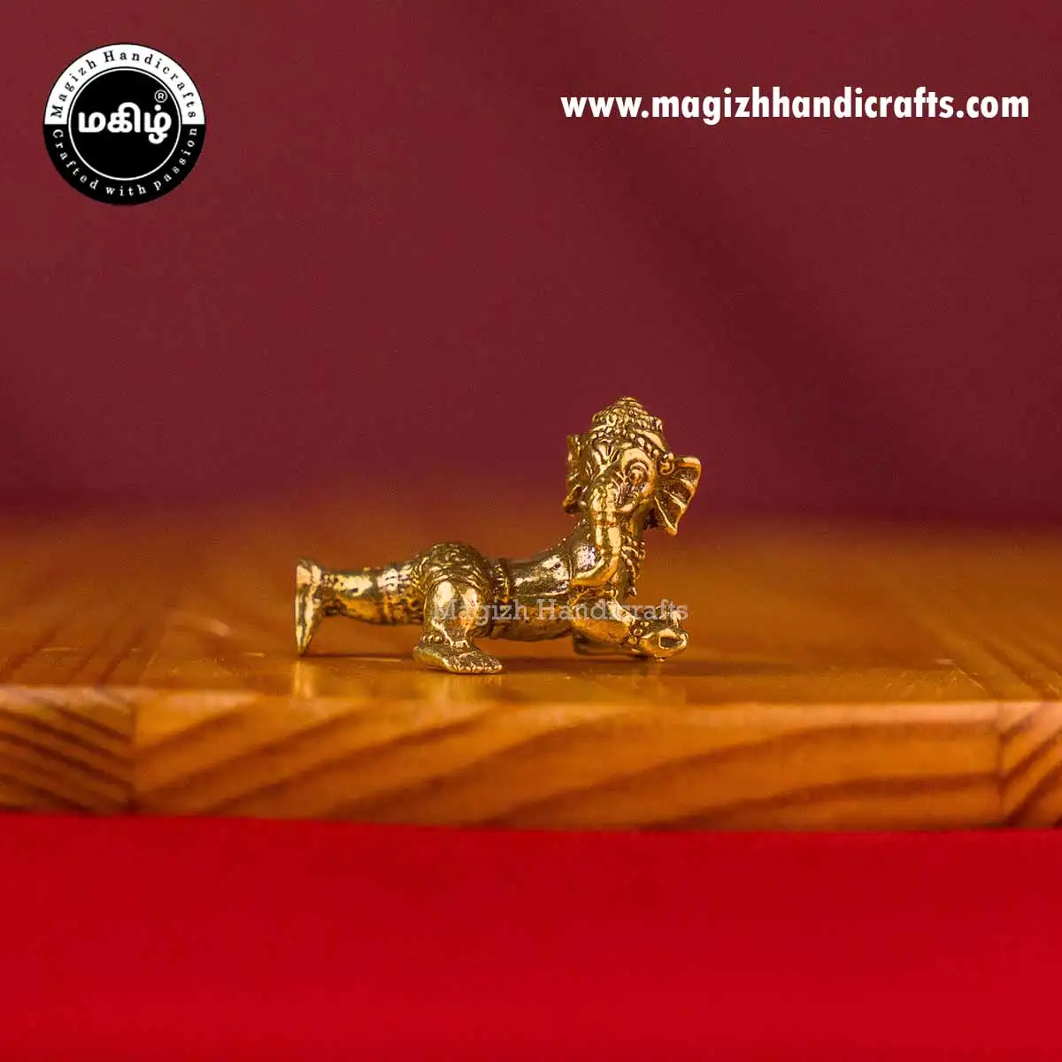 Brass mini baby Ganesha idol - 1 inch
